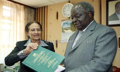 President Kibaki receives the report on  Saitoti helicopter crash enquiry from Lady Justice Rawal at his Harambee House office/PPS