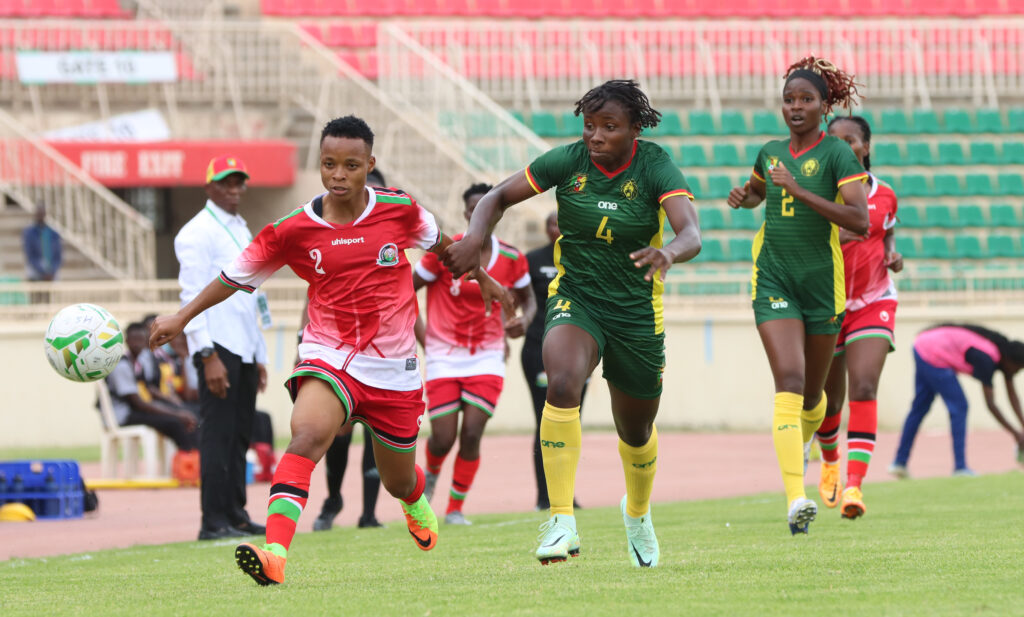 Mwanahalima 'Dogo' Adam proved a handful for Cameroon defender Mariane Ines Maague. PHOTO/Timothy Olobulu