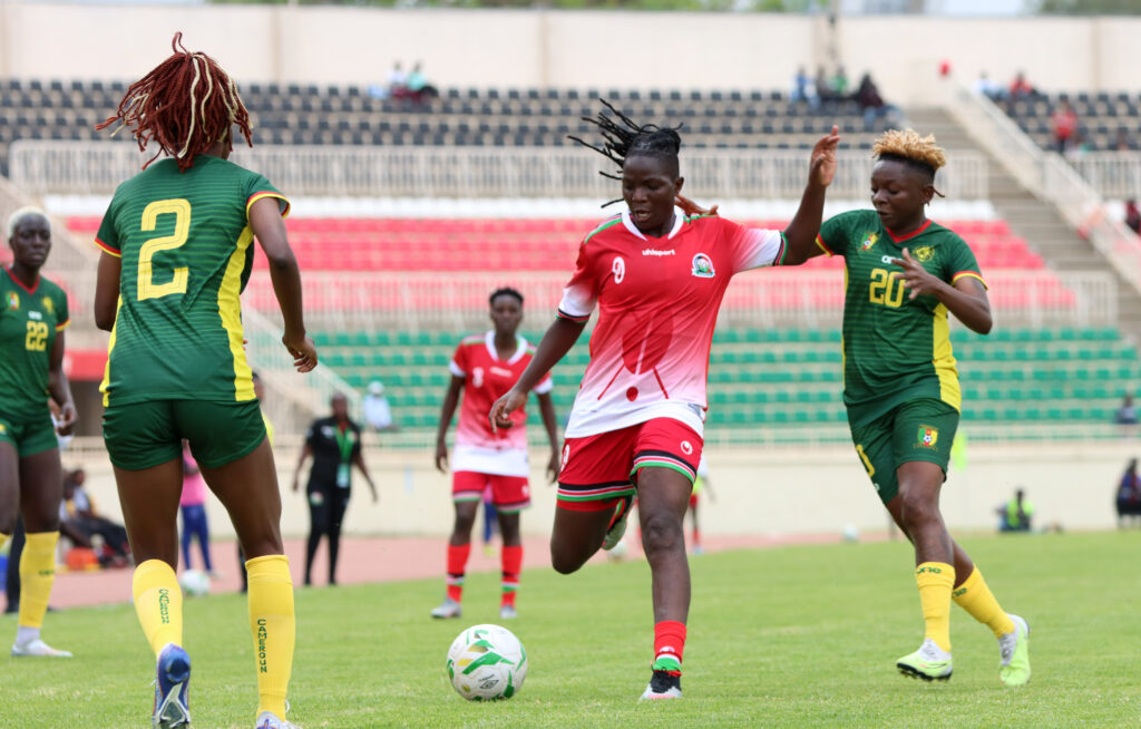 Terry Engesha tries to find her way past her marker. PHOTO/Timothy Olobulu